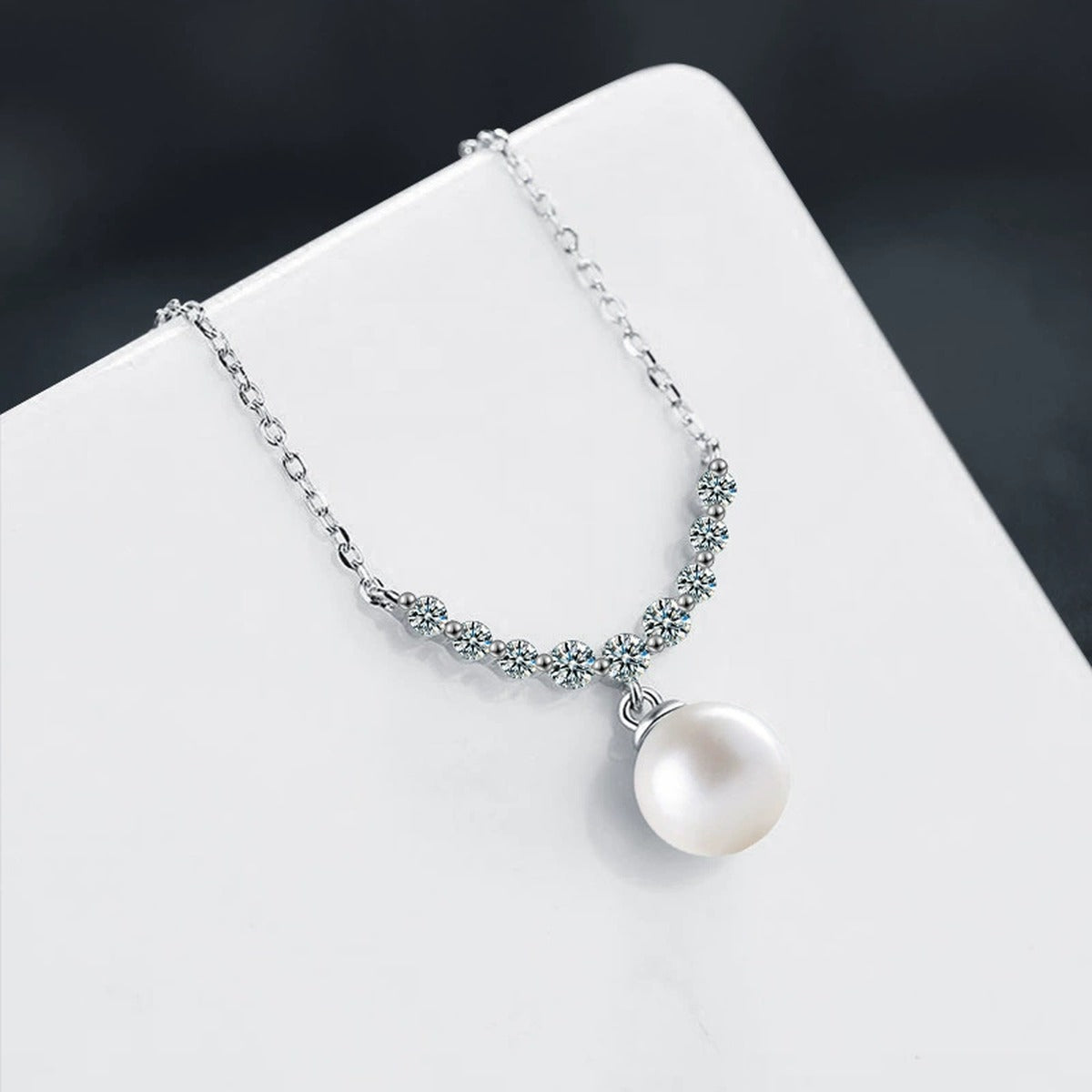 Smile Moissanite and Pearl Necklace in White Gold-Plated S925 sterling silver display scene showing chain and stone layout