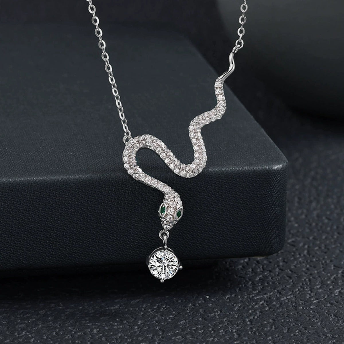 Snake Round Moissanite Necklace with CZ in White Gold-Plated S925 sterling silver blue display scene showing chain and stone layout