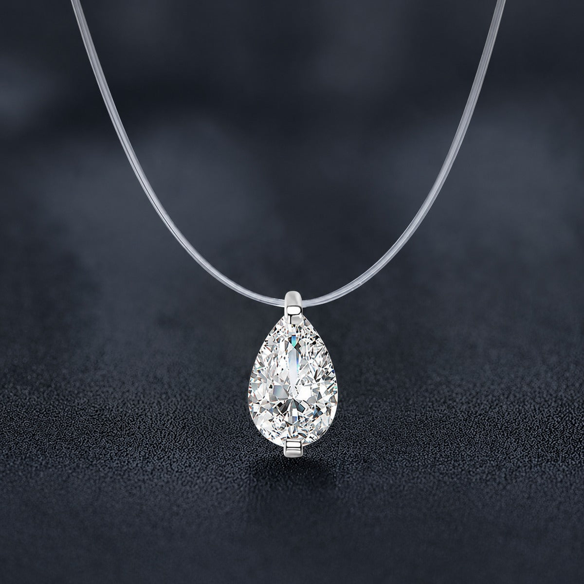 Pear Cut Moissanite Illusion Necklace in Gold-Plated S925 sterling silver close-up styled product scene showing pendant setting