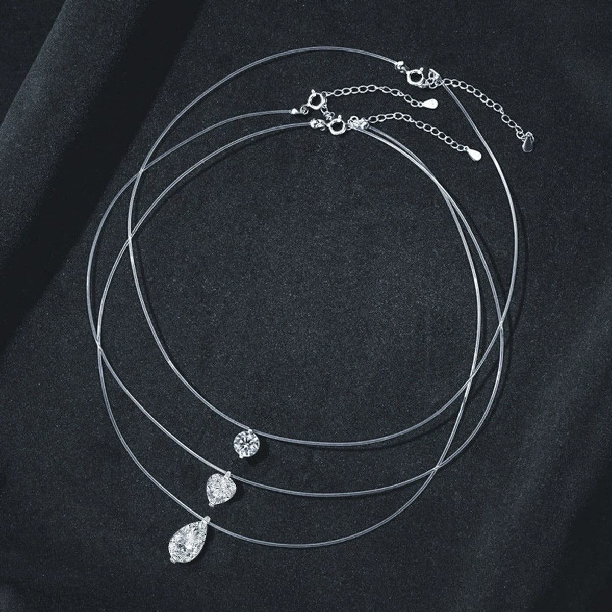 Pear Cut Moissanite Illusion Necklace in Gold-Plated S925 sterling silver display scene showing chain and stone layout