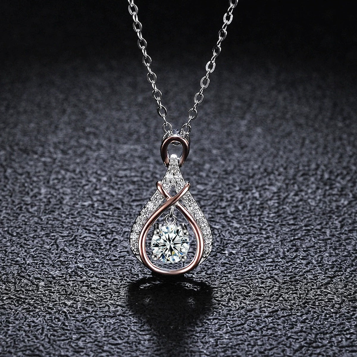 Two-Tone Dancing Round Moissanite Teardrop Necklace with CZ in S925 sterling silver display scene showing chain and stone layout