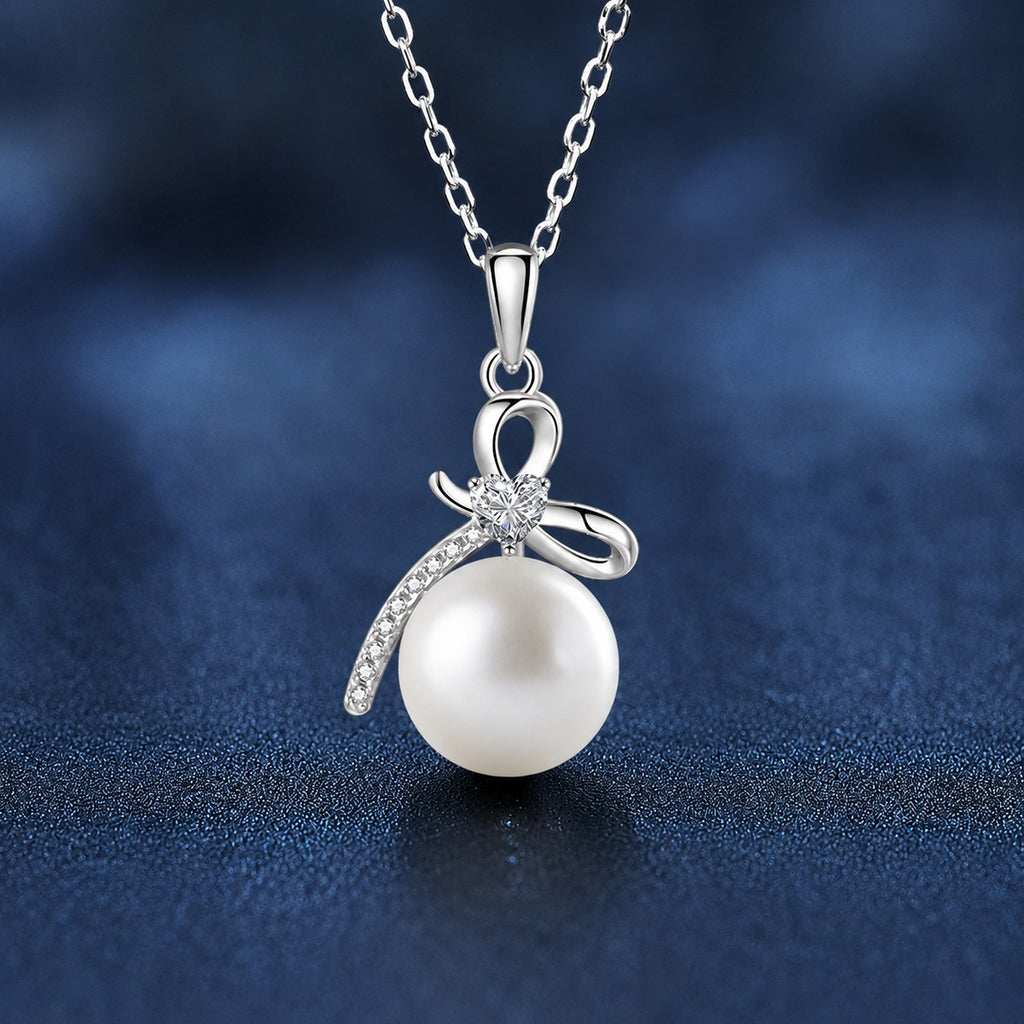 Bowknot Pearl Heart Cut Moissanite Necklace with CZ in Gold-Plated S925 sterling silver dark display product view showing pendant and chain
