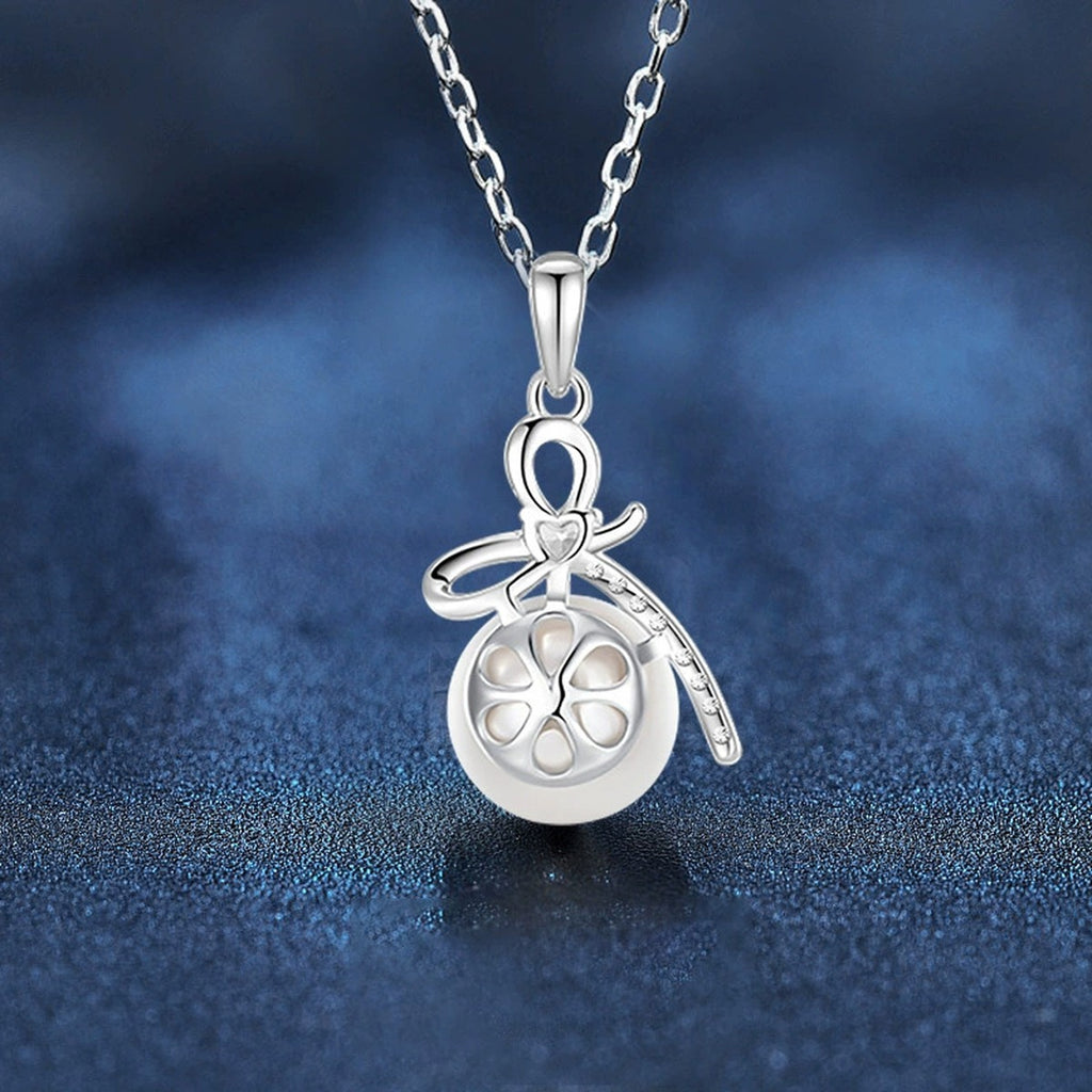 Bowknot Pearl Heart Cut Moissanite Necklace with CZ in Gold-Plated S925 sterling silver angled necklace detail showing pendant profile