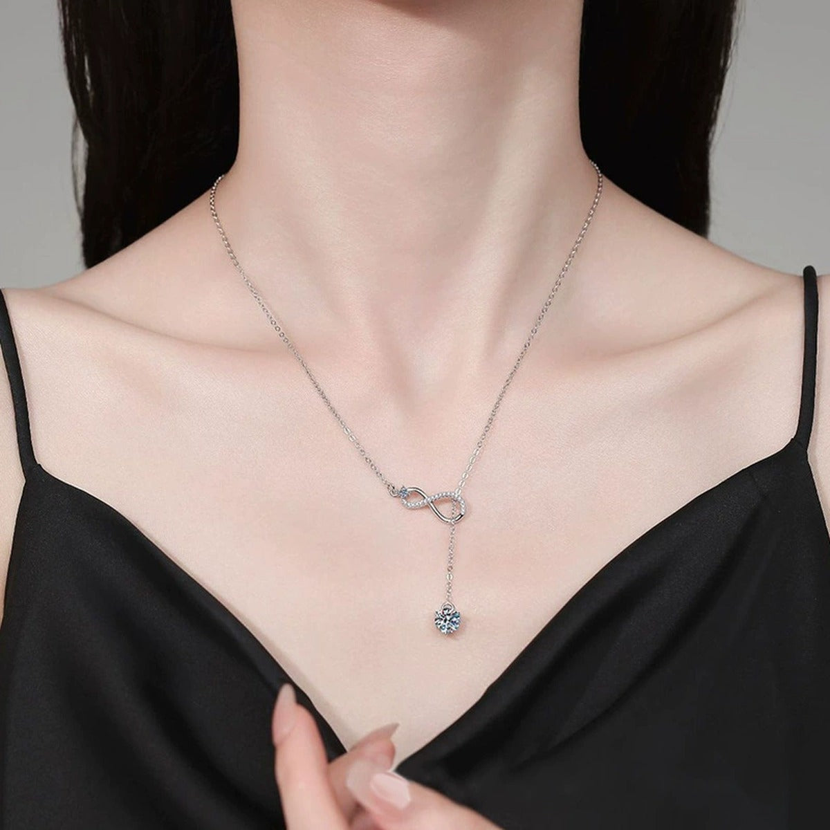 Infinity Drop Round Moissanite Necklace with CZ in Gold-Plated S925 sterling silver neckline model view showing pendant scale and chain length
