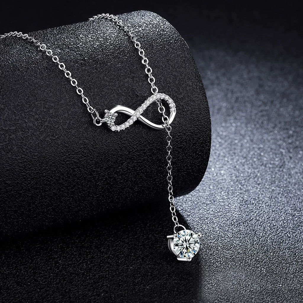 Infinity Drop Round Moissanite Necklace with CZ in Gold-Plated S925 sterling silver close-up styled product scene showing pendant setting