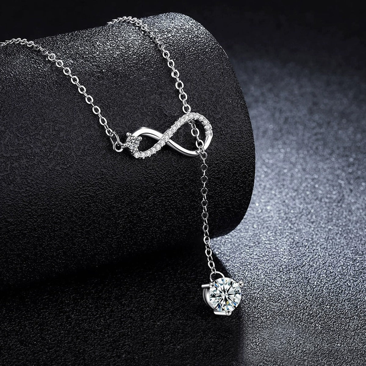 Infinity Drop Round Moissanite Necklace with CZ in Gold-Plated S925 sterling silver close-up styled product scene showing pendant setting