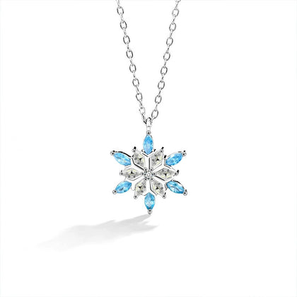 Blue CZ Snowflake Moissanite Necklace in White Gold-Plated S925 sterling silver white background front product view showing a snowflake composed of round moissanite and blue CZ points