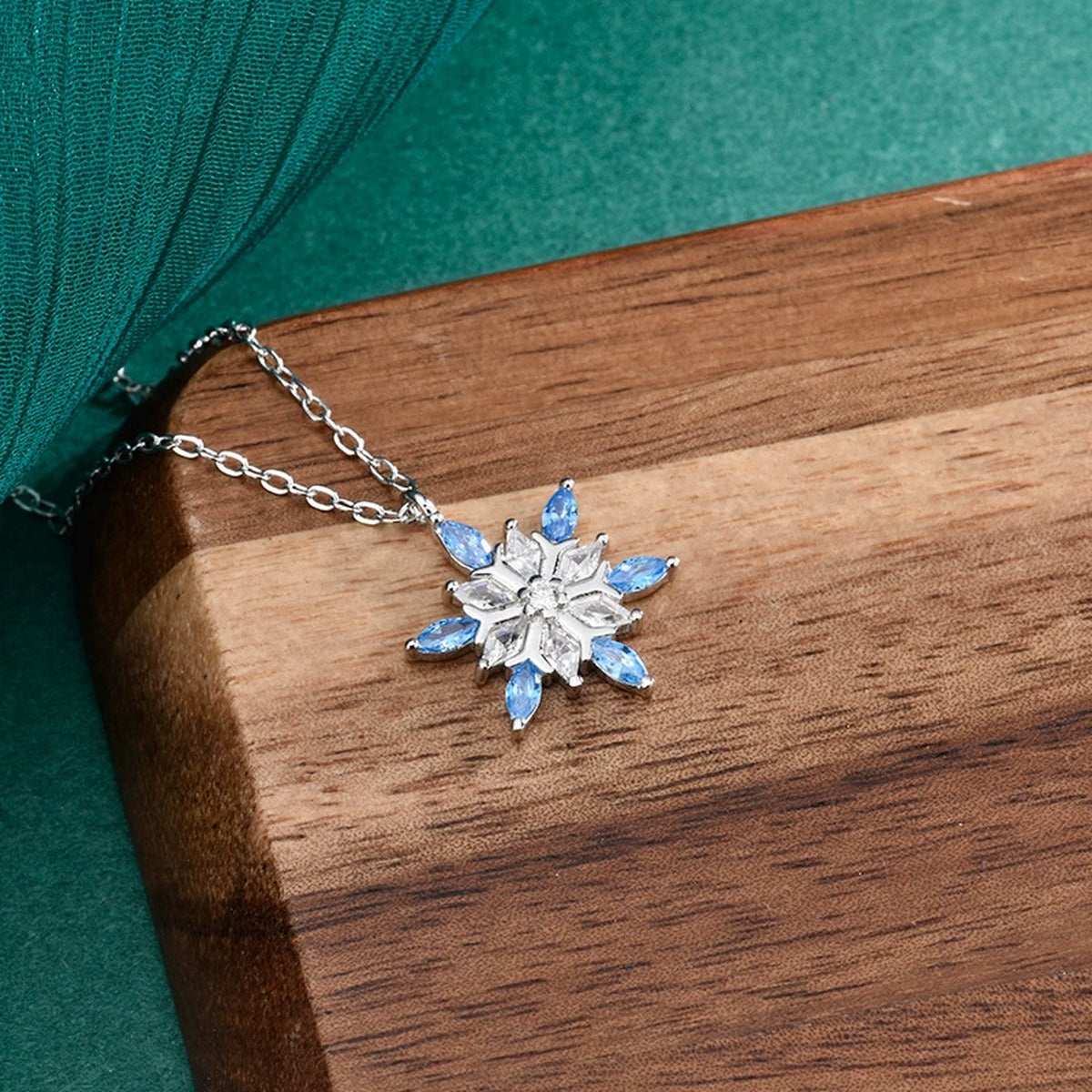 Blue CZ Snowflake Moissanite Necklace in White Gold-Plated S925 sterling silver display scene showing chain and stone layout