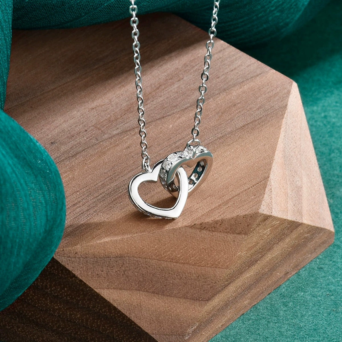 Interlocking Heart Moissanite Necklace in White Gold-Plated S925 sterling silver display scene showing chain and stone layout