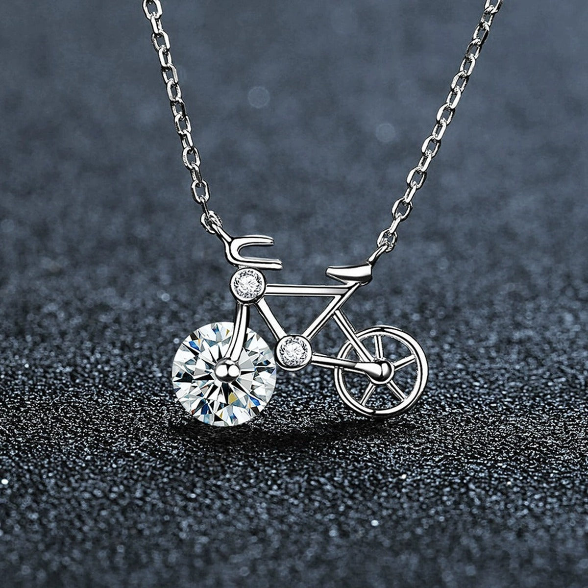Bicycle Round Moissanite Necklace in Gold-Plated S925 sterling silver close-up styled product scene showing pendant setting