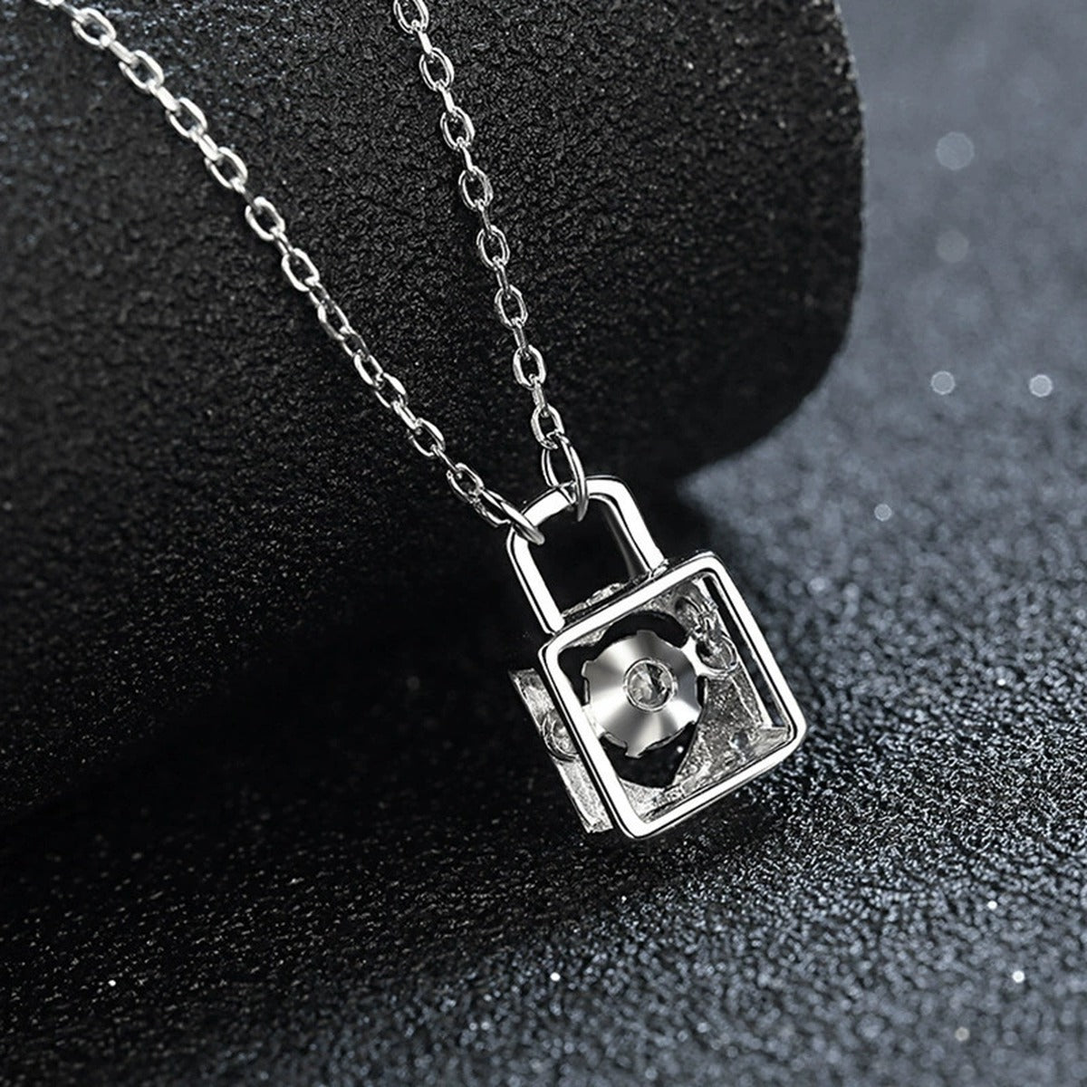 Heart Lock Round Moissanite Necklace in Gold-Plated S925 sterling silver close-up styled product scene showing pendant setting
