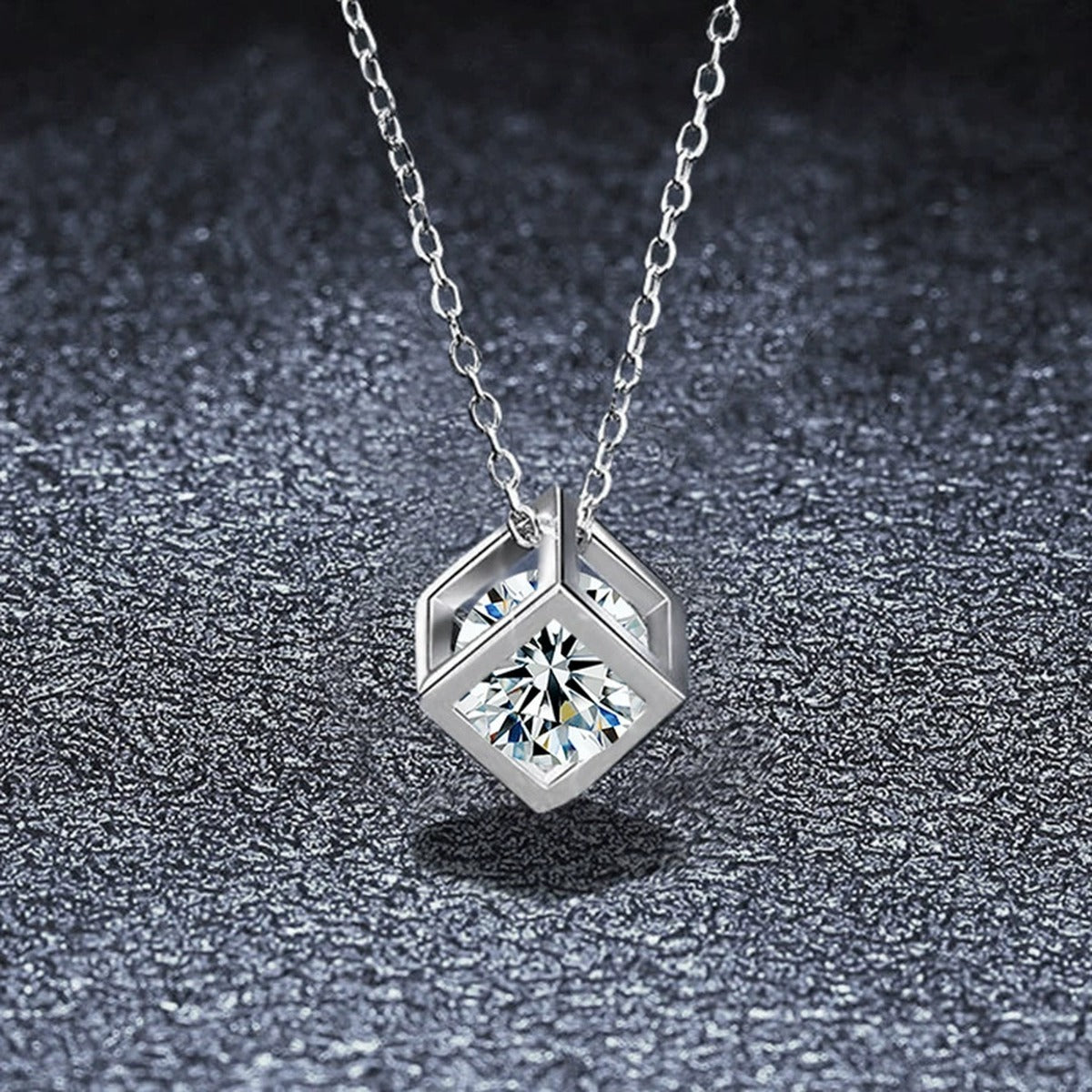 Open Cube Round Moissanite Necklace in Gold-Plated S925 sterling silver close-up styled product scene showing pendant setting