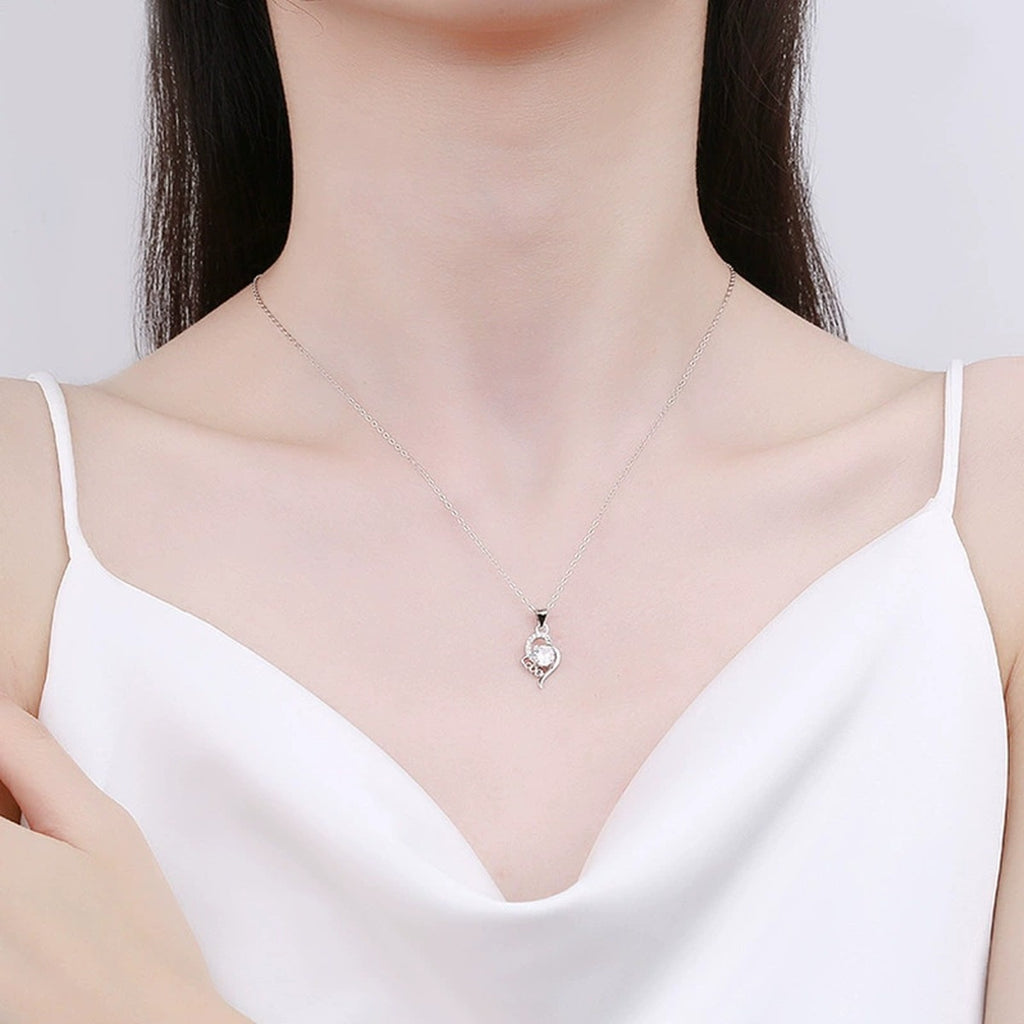 Love Heart Round Moissanite Necklace with CZ in Gold-Plated S925 sterling silver neckline model view showing pendant scale and chain length