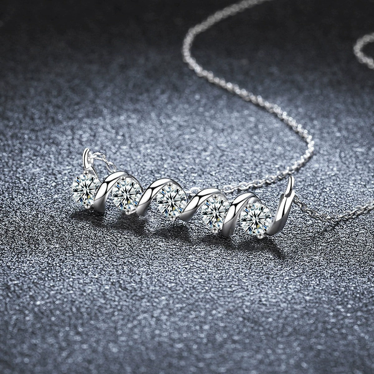 Spiral Five-Stone Round Moissanite Bar Necklace in Gold-Plated S925 sterling silver close-up product scene showing stone setting