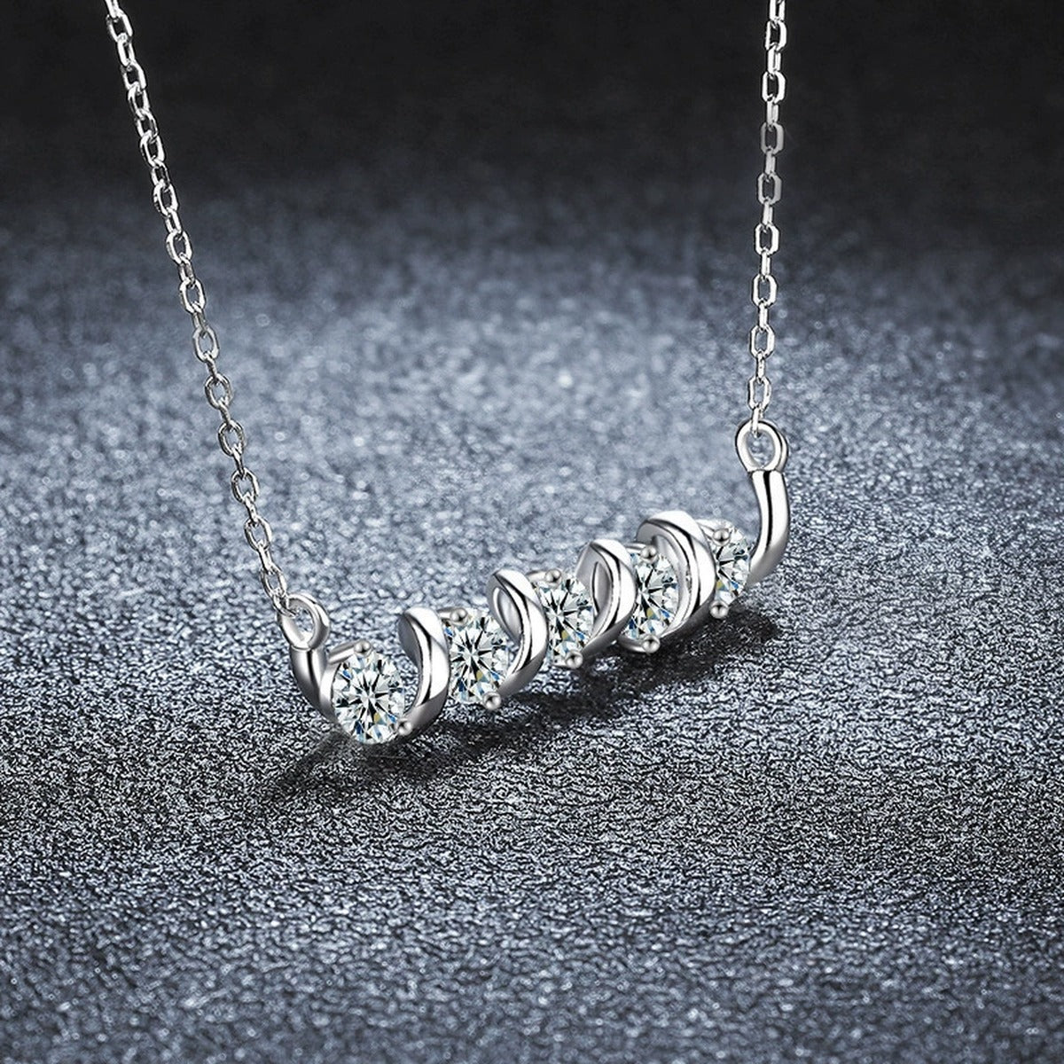 Spiral Five-Stone Round Moissanite Bar Necklace in Gold-Plated S925 sterling silver angled necklace detail showing pendant profile