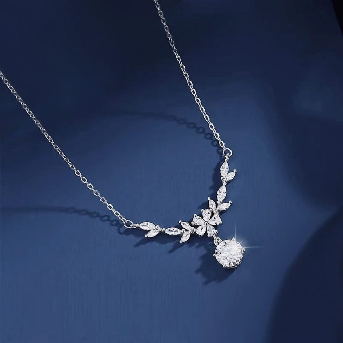 Wheat Branch Round Moissanite Necklace with CZ in Gold-Plated S925 sterling silver close-up styled product scene showing pendant setting