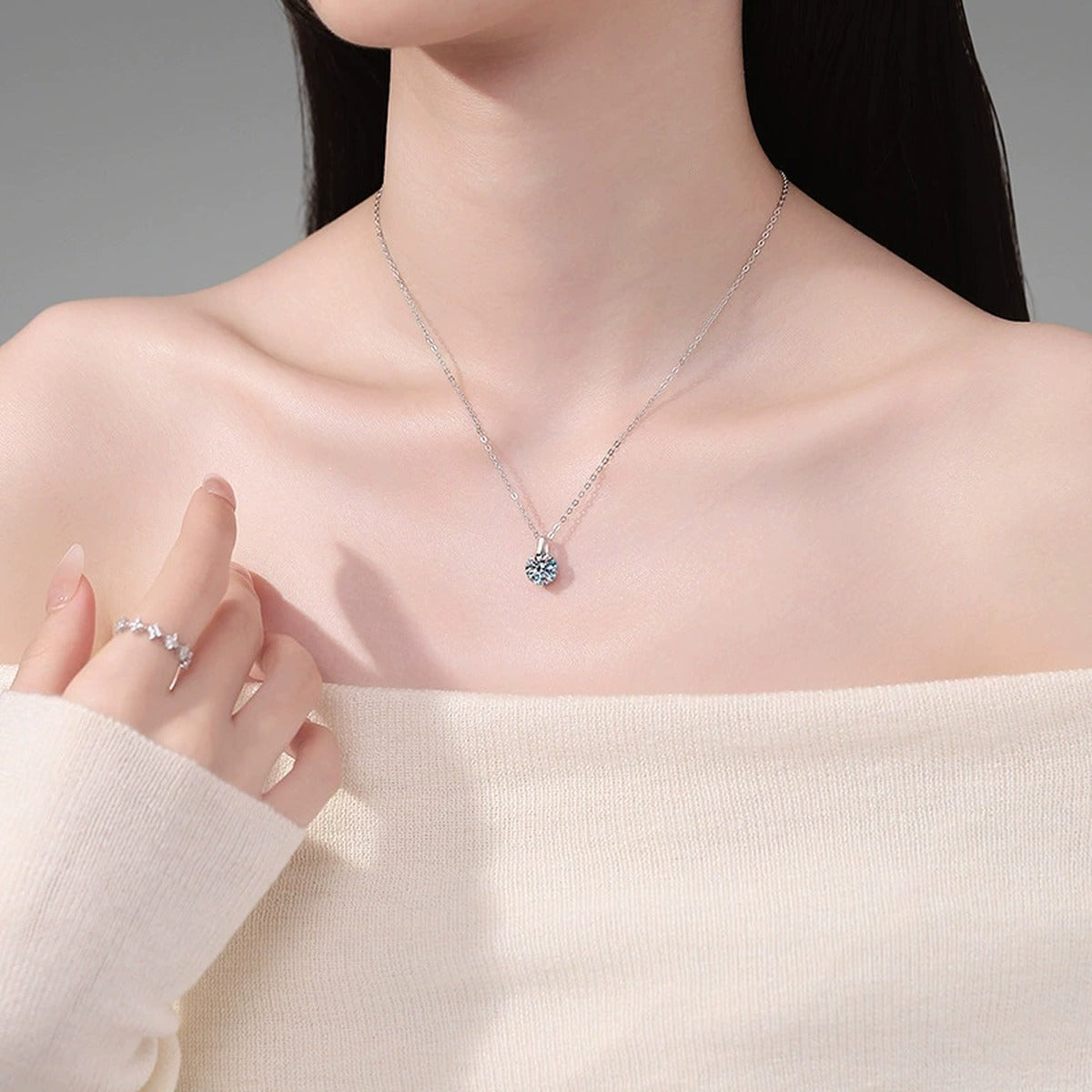Six-Prong Round Moissanite Solitaire Necklace in Gold-Plated S925 sterling silver neckline model view showing pendant scale and chain length