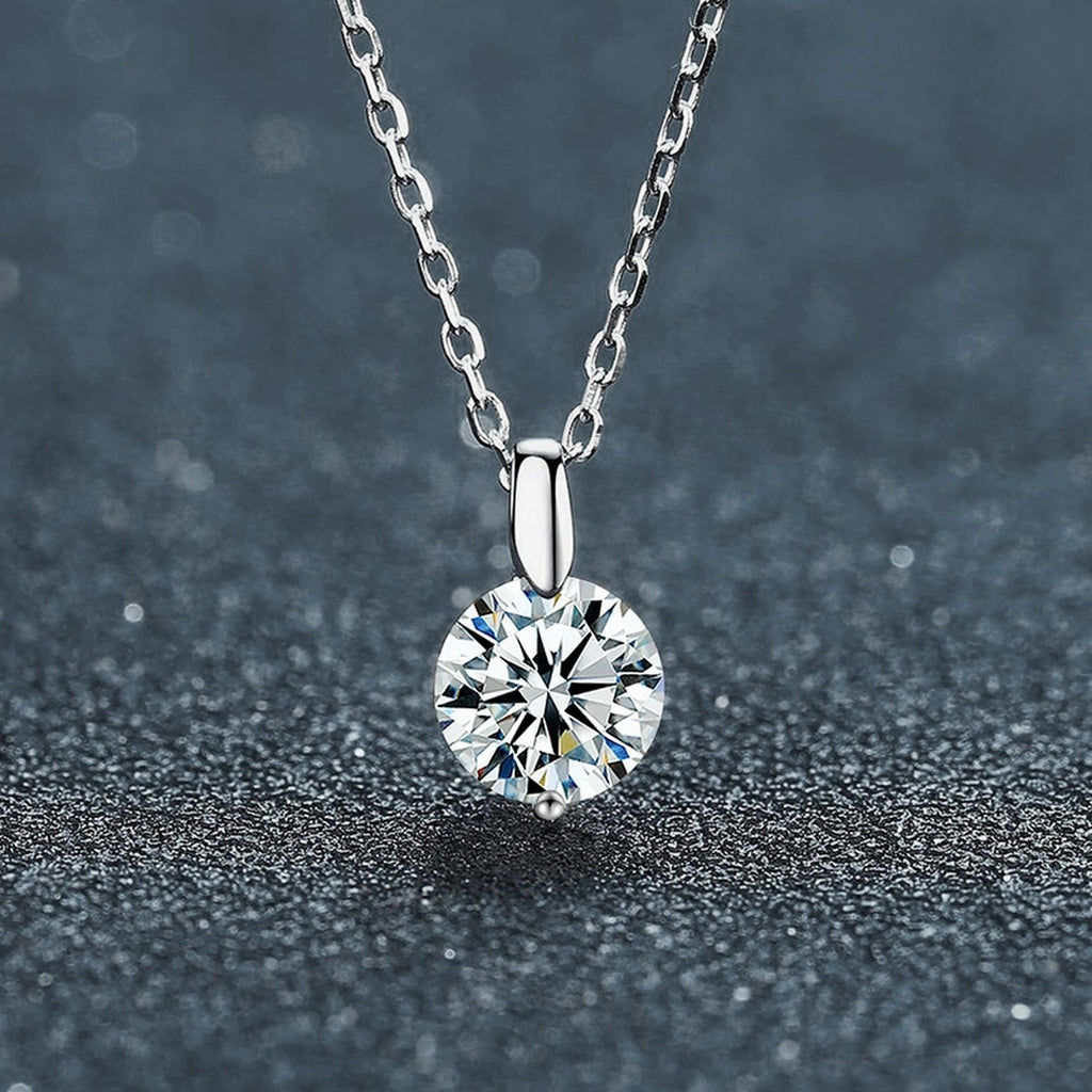 Six-Prong Round Moissanite Solitaire Necklace in Gold-Plated S925 sterling silver close-up styled product scene showing pendant setting