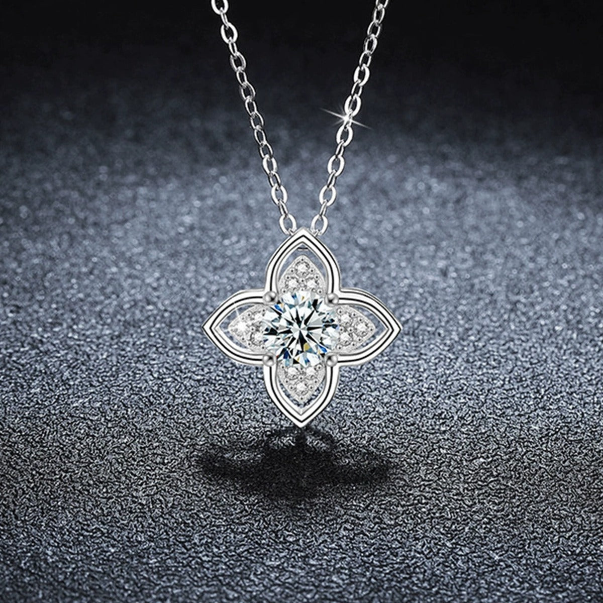 Four-Leaf Clover Round Moissanite Necklace with CZ in Gold-Plated S925 sterling silver close-up styled product scene showing pendant setting