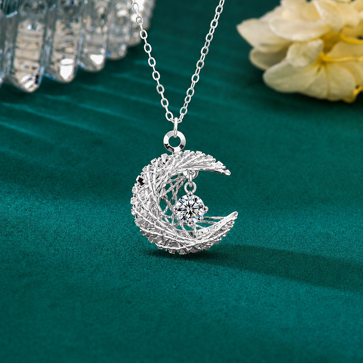 Crescent Moon Nest Round Moissanite Necklace in Gold-Plated S925 sterling silver close-up styled product scene showing pendant setting