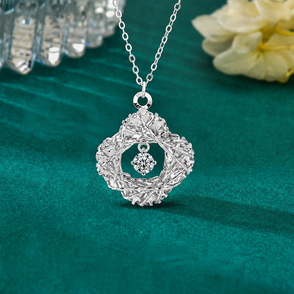 Clover Nest Dancing Round Moissanite Necklace in Gold-Plated S925 sterling silver close-up styled product scene showing pendant setting