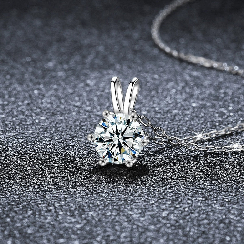 Six-Prong Round Moissanite Solitaire Necklace in Gold-Plated S925 sterling silver close-up styled product scene showing pendant setting