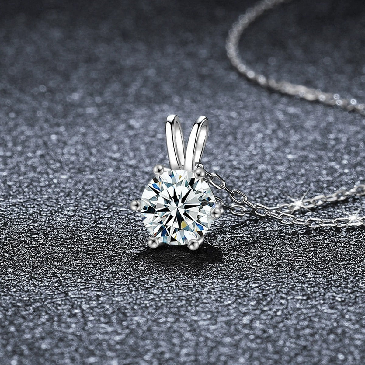 Six-Prong Round Moissanite Solitaire Necklace in Gold-Plated S925 sterling silver close-up styled product scene showing pendant setting