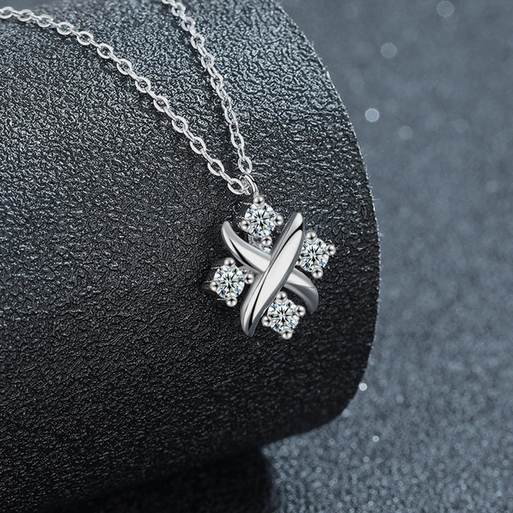 X Motif Round Moissanite Necklace in Gold-Plated S925 sterling silver close-up styled product scene showing pendant setting