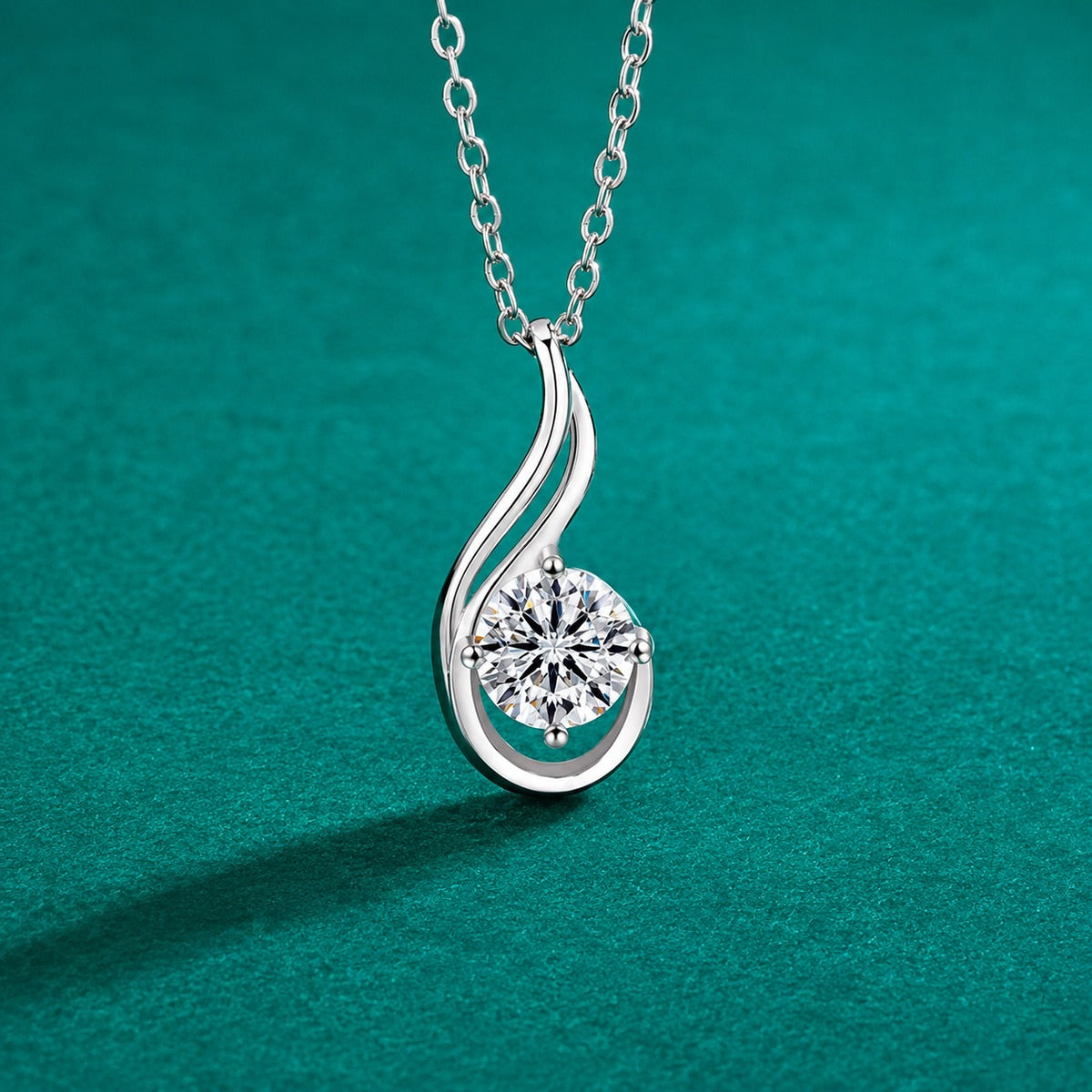 Flame Teardrop Round Moissanite Necklace in Gold-Plated S925 sterling silver close-up styled product scene showing pendant setting