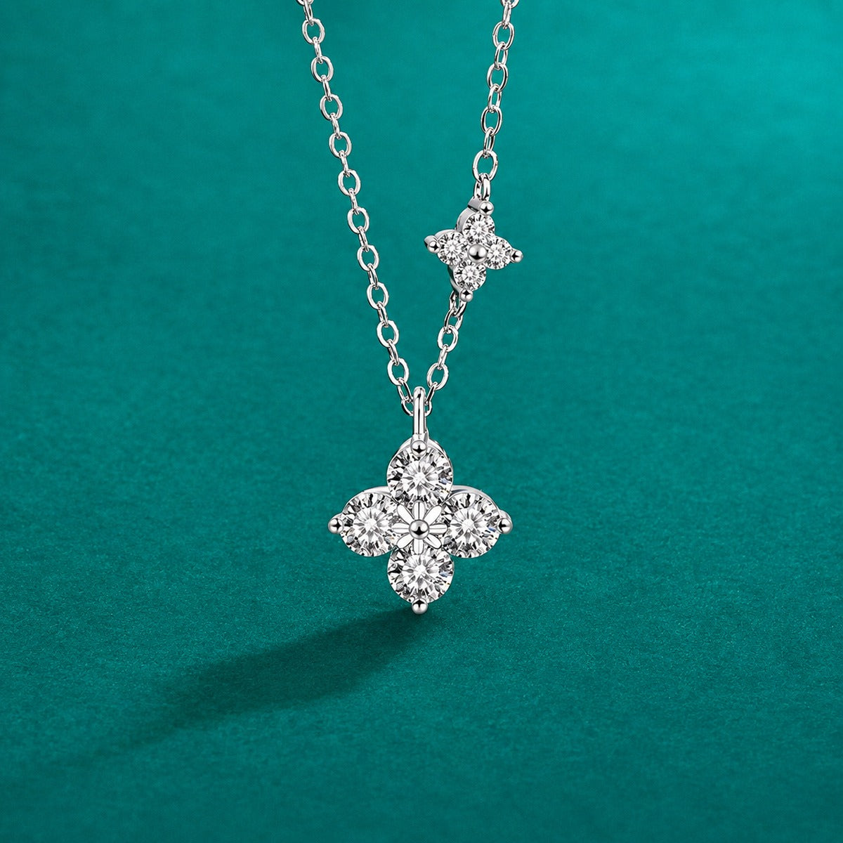 Four-Leaf Clover Round Moissanite Necklace in Gold-Plated S925 sterling silver close-up styled product scene showing pendant setting
