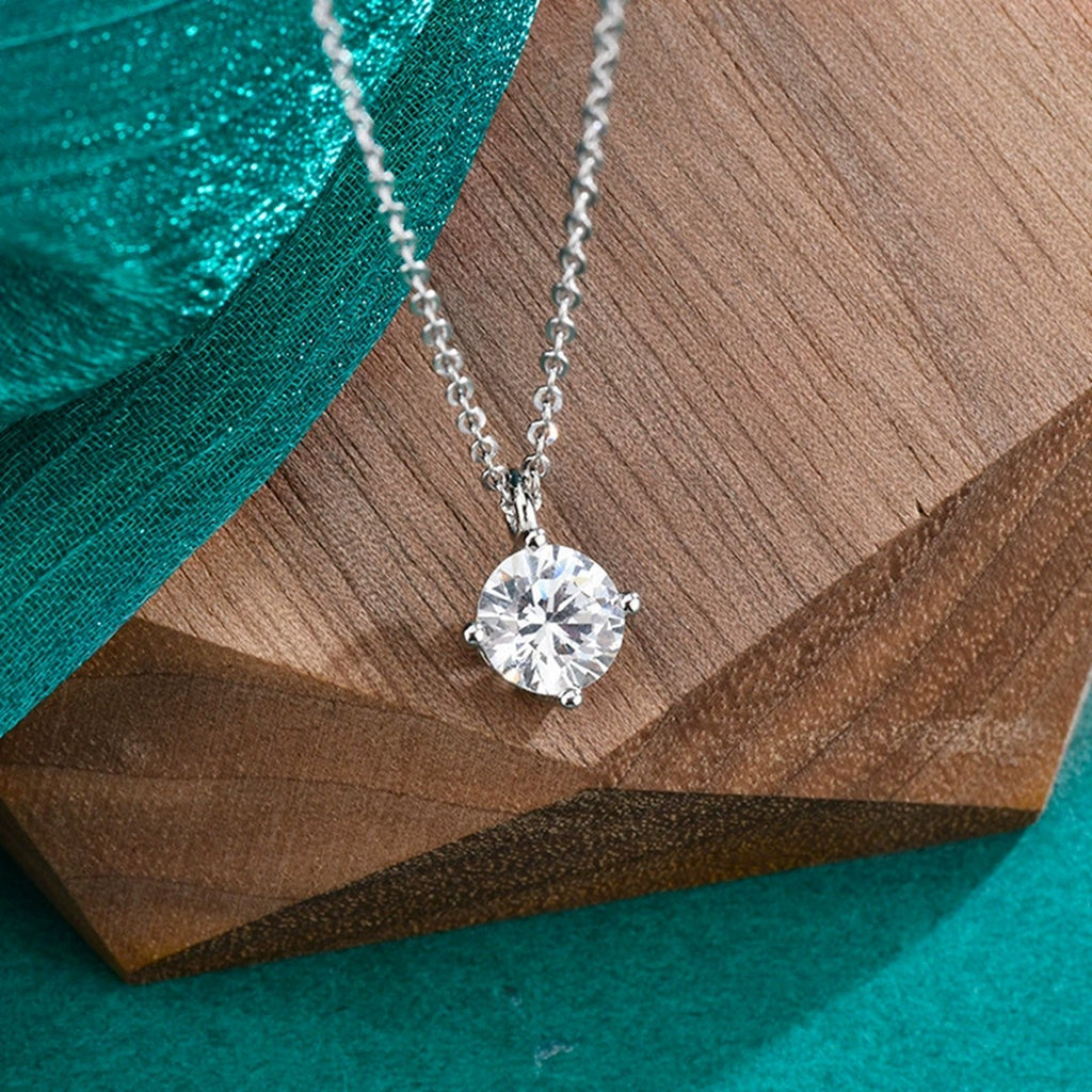 Four-Prong Round Moissanite Pendant Necklace in Gold-Plated S925 sterling silver display scene showing chain and stone layout