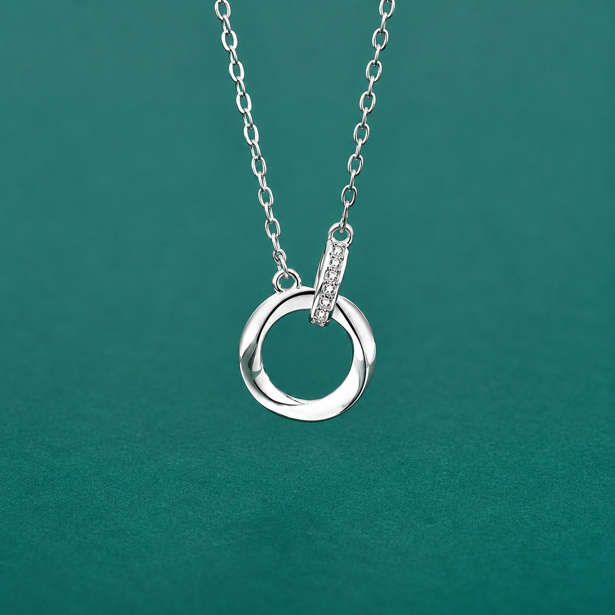 Interlocking Circle Pave Moissanite Necklace in Gold-Plated S925 sterling silver close-up styled product scene showing pendant setting