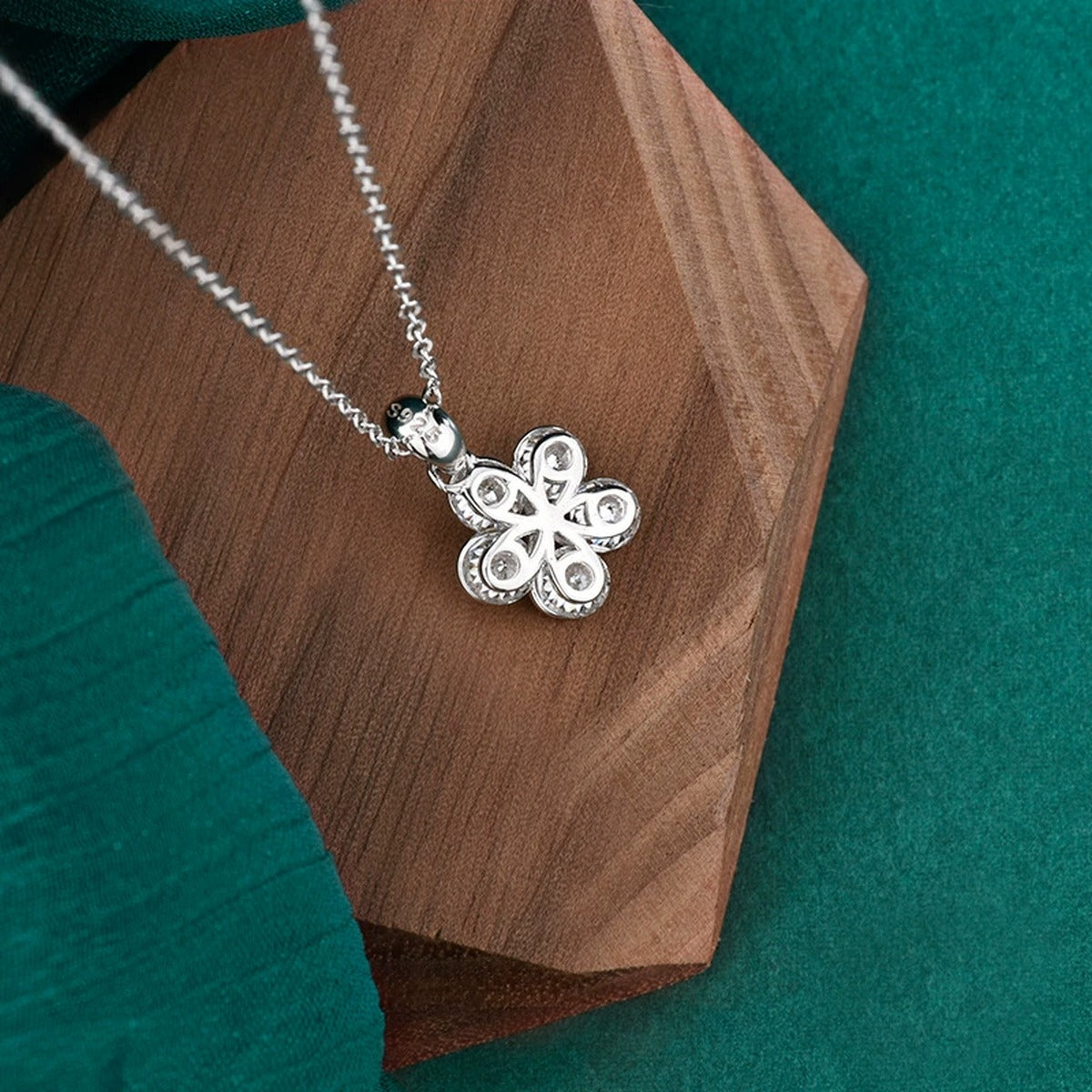 Five-Petal Flower Round Moissanite Necklace in Gold-Plated S925 sterling silver angled product detail view