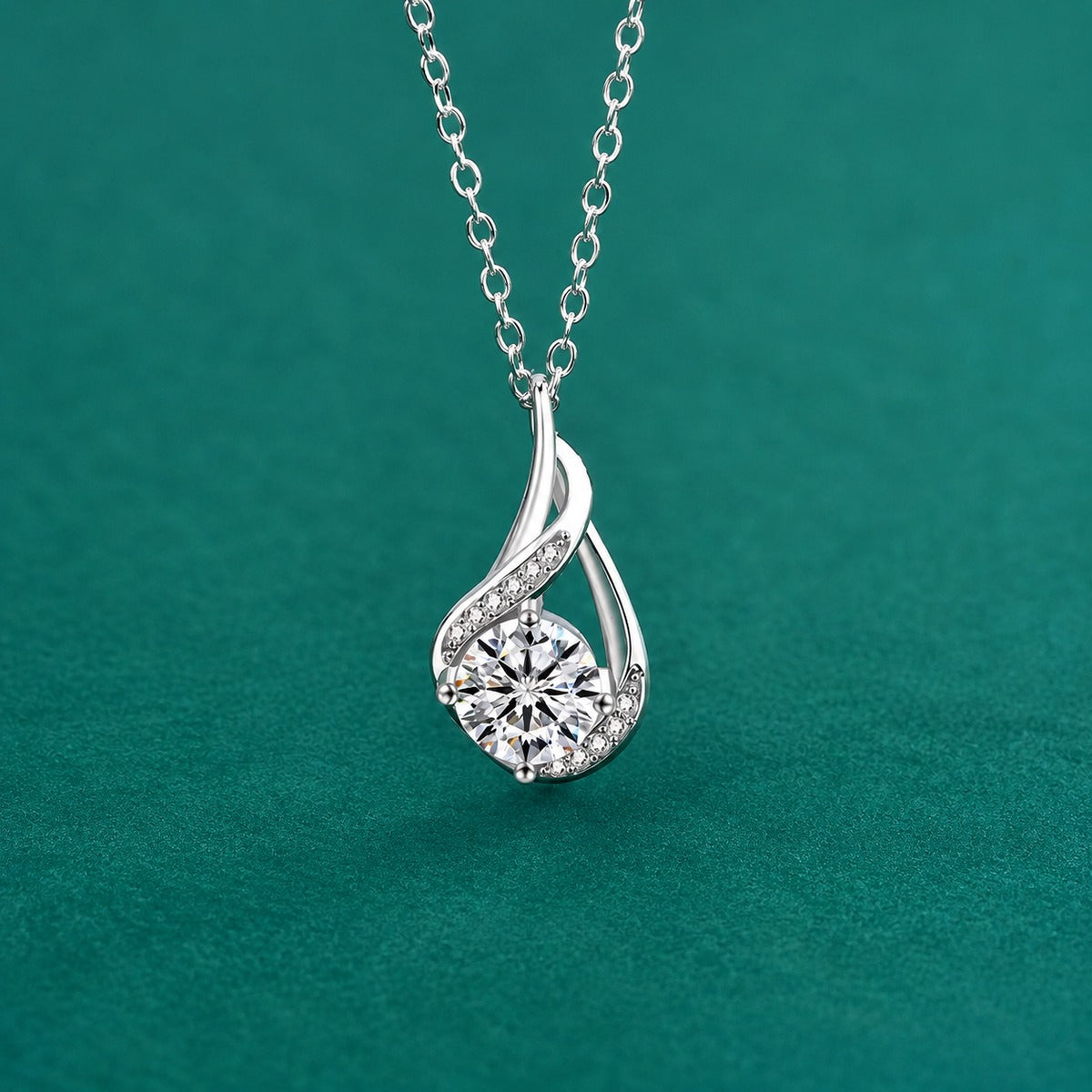 Teardrop Swirl Round Moissanite Necklace with CZ in Gold-Plated S925 sterling silver close-up styled product scene showing pendant setting
