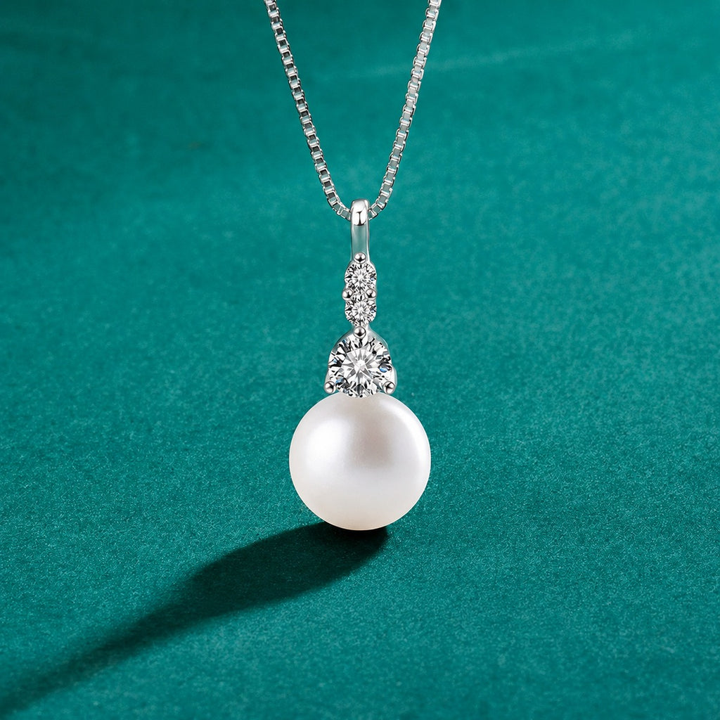 Pearl Drop Round Moissanite Necklace in Gold-Plated S925 sterling silver close-up styled product scene showing pendant setting