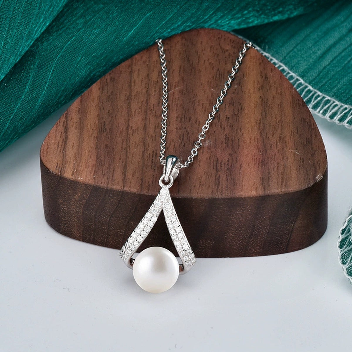 V-Shape Button Pearl Moissanite Necklace in Gold-Plated S925 sterling silver display scene showing chain and stone layout