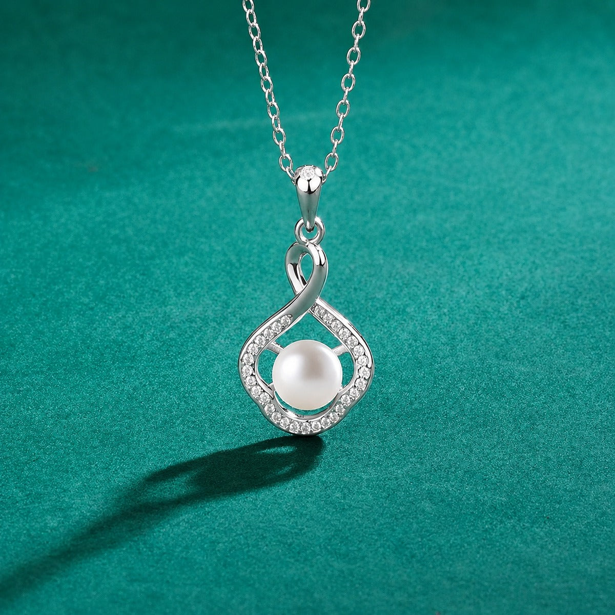 Floral Pearl Round Moissanite Necklace in White Gold-Plated S925 sterling silver close-up styled product scene showing pendant setting