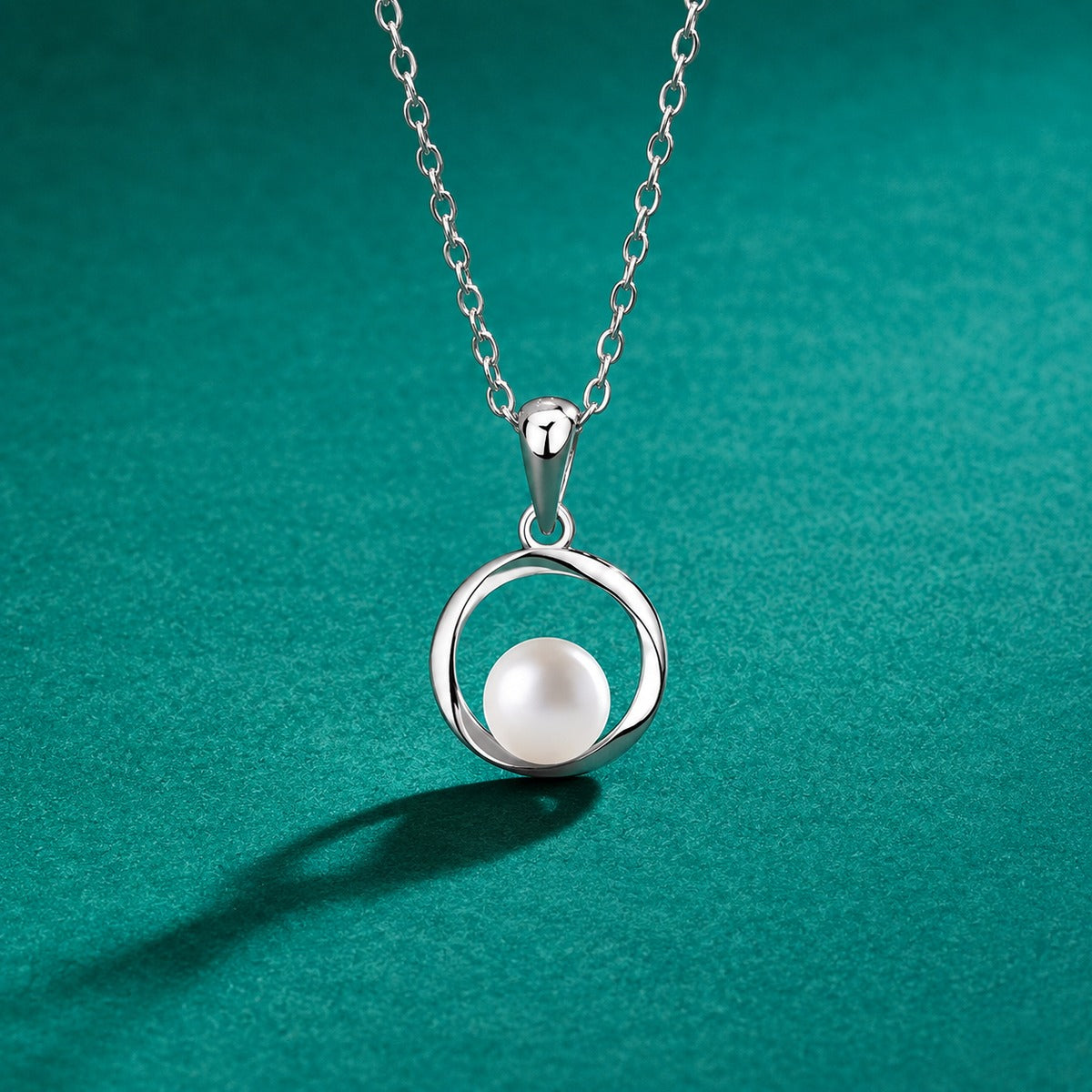 Circle Freshwater Pearl Necklace in White Gold-Plated S925 sterling silver close-up styled product scene showing pendant setting