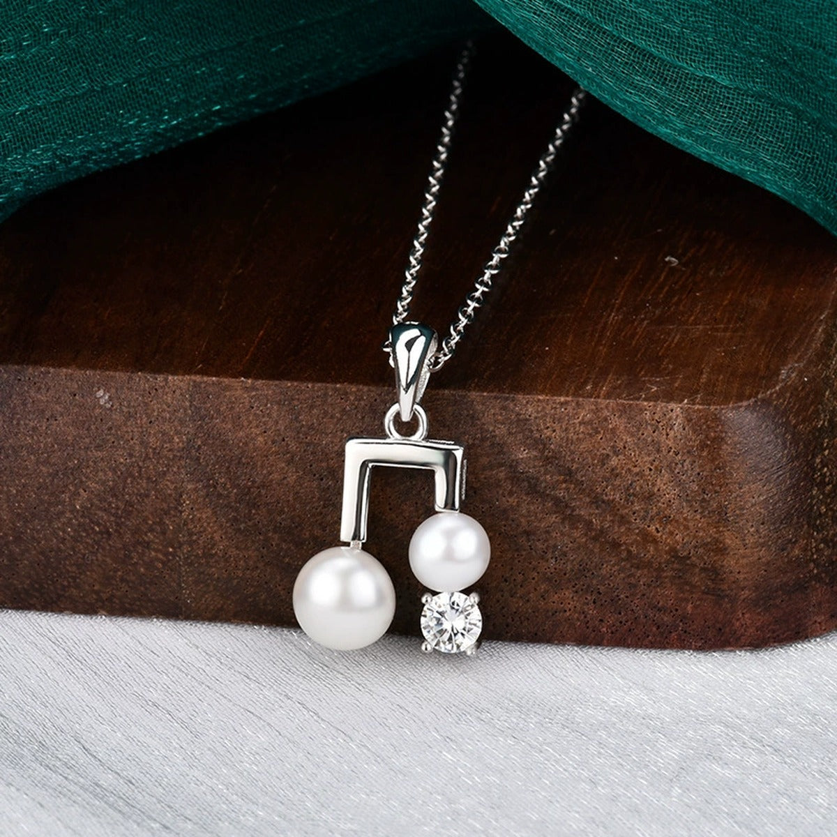 Musical Note Pearl Round Moissanite Necklace in White Gold-Plated S925 sterling silver angled product detail view