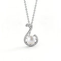 Treble Clef Pearl Round Moissanite Necklace in White Gold-Plated S925 sterling silver white background front product view showing treble clef pendant traced in round moissanite around a button pearl