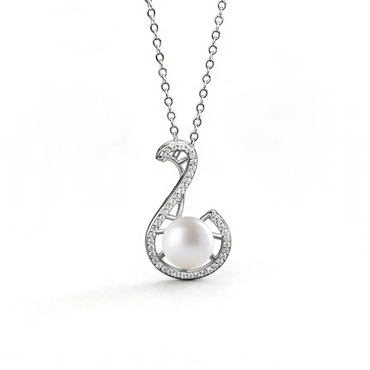 Treble Clef Pearl Round Moissanite Necklace in White Gold-Plated S925 sterling silver white background front product view showing treble clef pendant traced in round moissanite around a button pearl