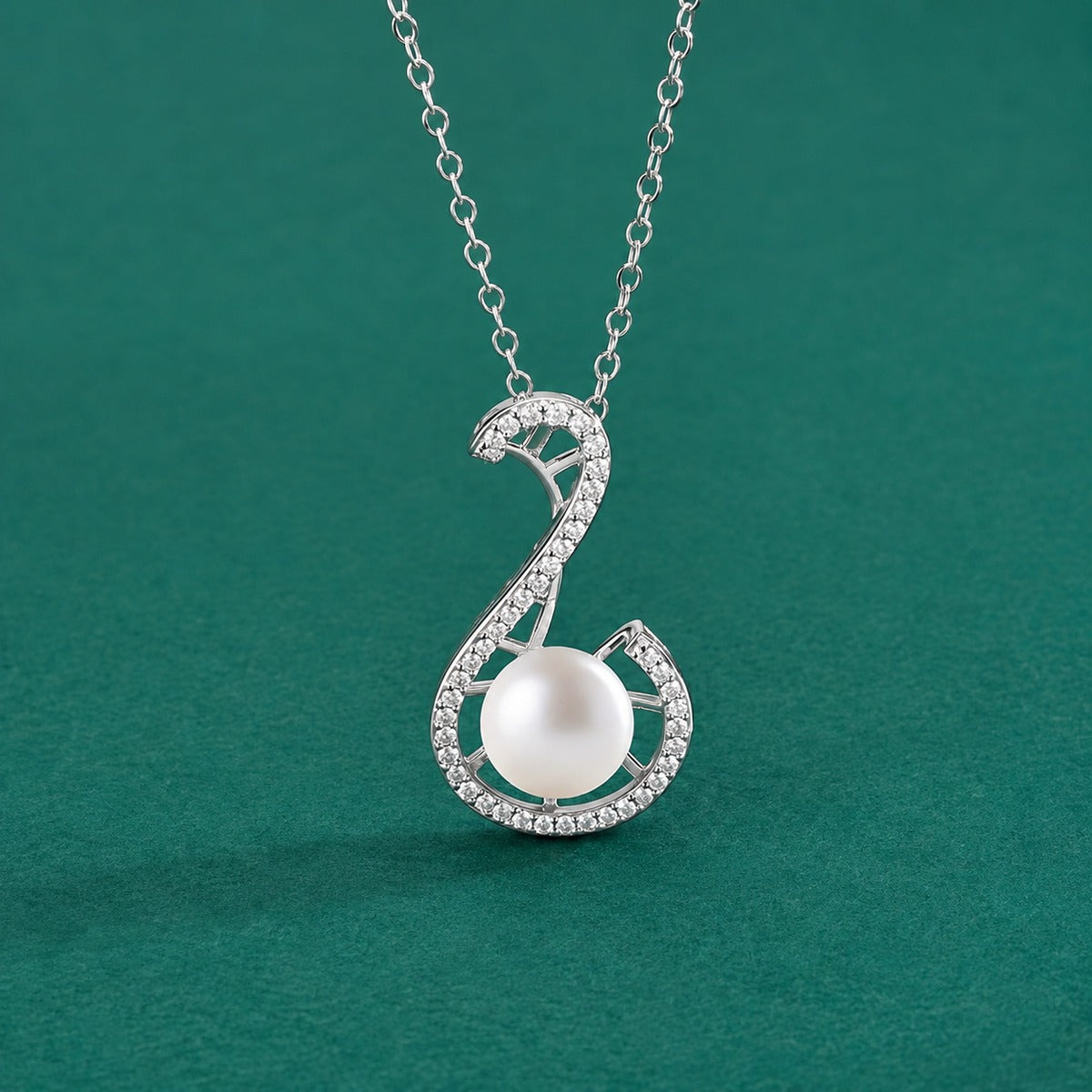 Treble Clef Pearl Round Moissanite Necklace in White Gold-Plated S925 sterling silver close-up styled product scene showing pendant setting