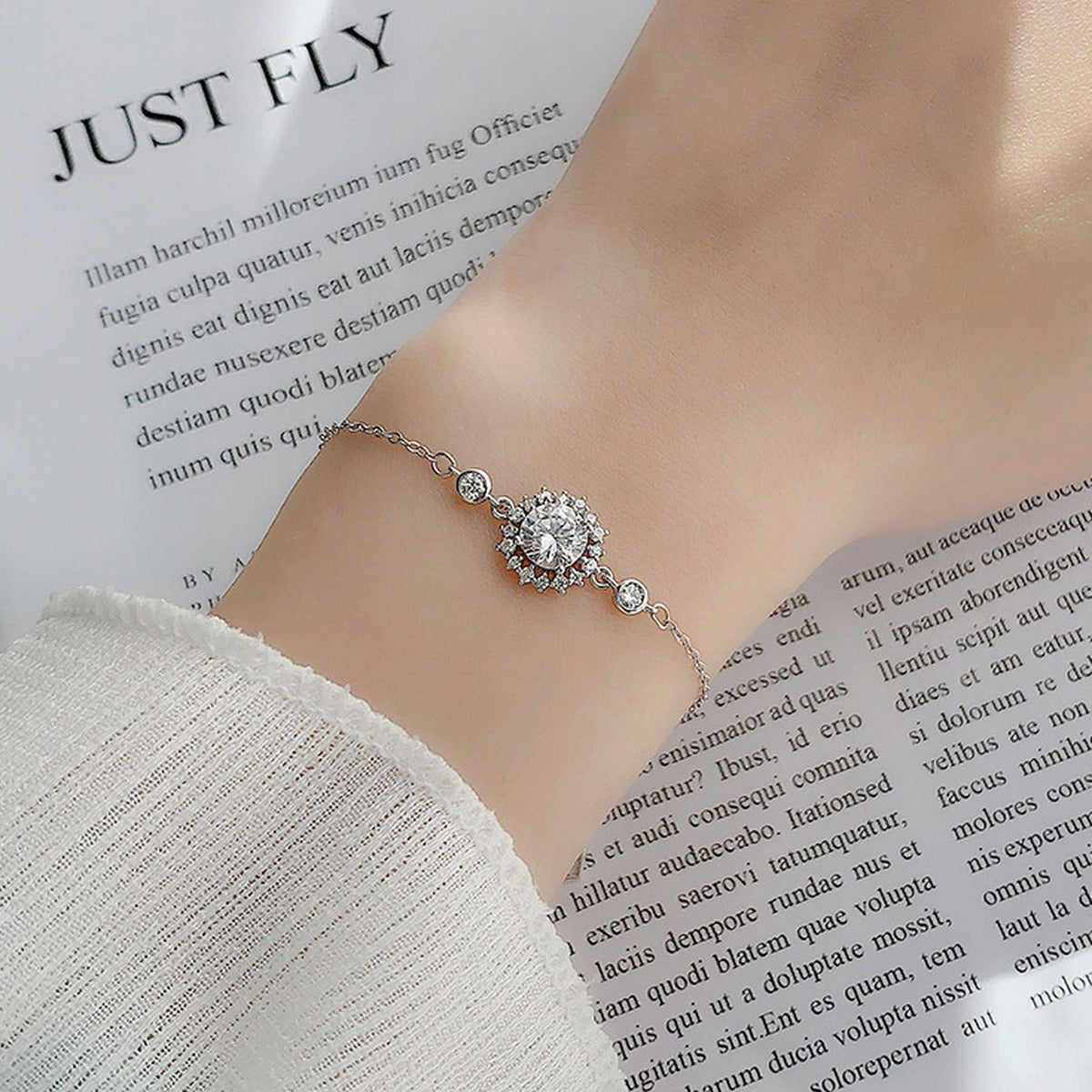 Sunflower Halo Round Moissanite Adjustable Bracelet with CZ in White Gold-Plated S925 Sterling Silver worn on the wrist showing bracelet scale, fit, and styling