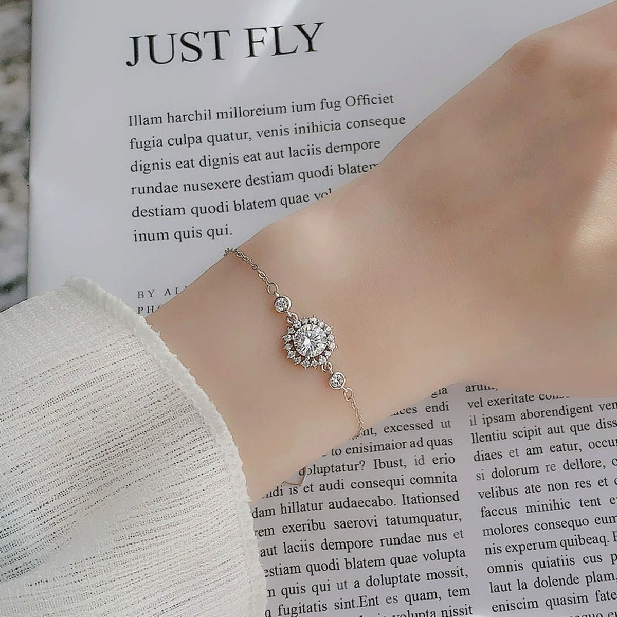 Sunflower Halo Round Moissanite Adjustable Bracelet with CZ in White Gold-Plated S925 Sterling Silver worn on the wrist showing bracelet scale, fit, and styling