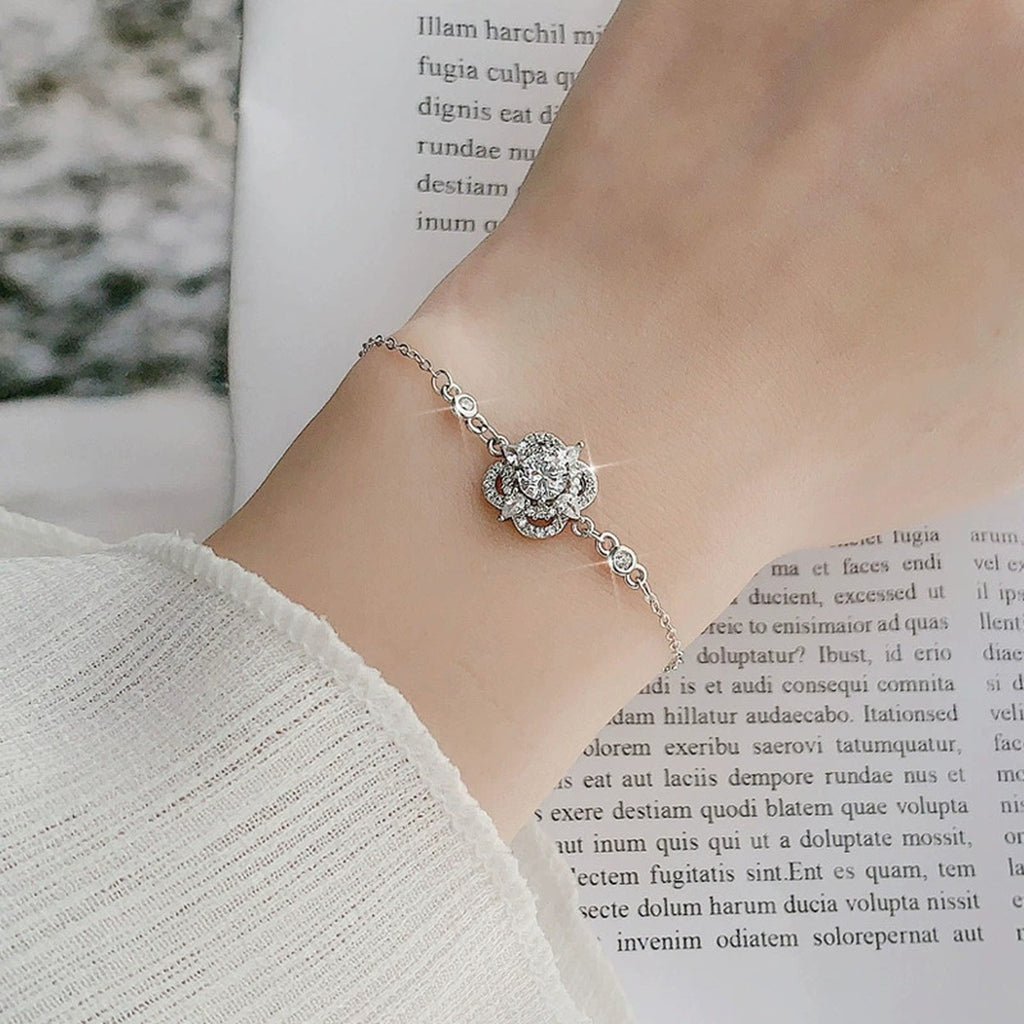 Four-Leaf Clover Round Moissanite Adjustable Bracelet with CZ in White Gold-Plated S925 Sterling Silver worn on the wrist showing bracelet scale, fit, and styling
