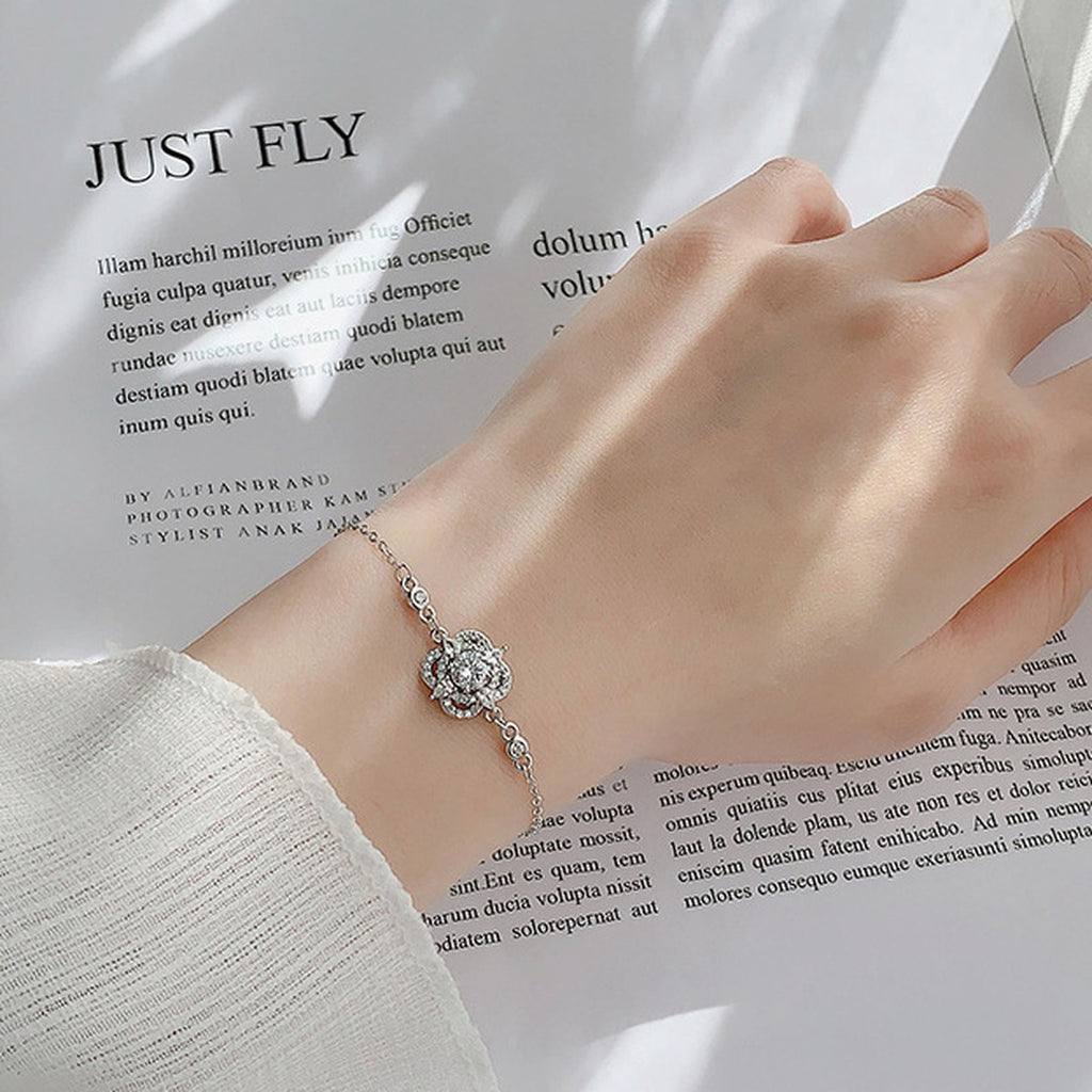 Four-Leaf Clover Round Moissanite Adjustable Bracelet with CZ in White Gold-Plated S925 Sterling Silver worn on the wrist showing bracelet scale, fit, and styling