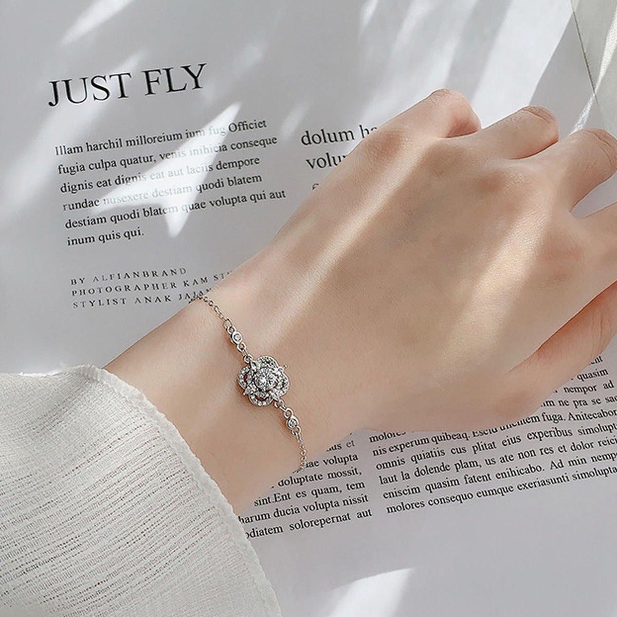 Four-Leaf Clover Round Moissanite Adjustable Bracelet with CZ in White Gold-Plated S925 Sterling Silver worn on the wrist showing bracelet scale, fit, and styling