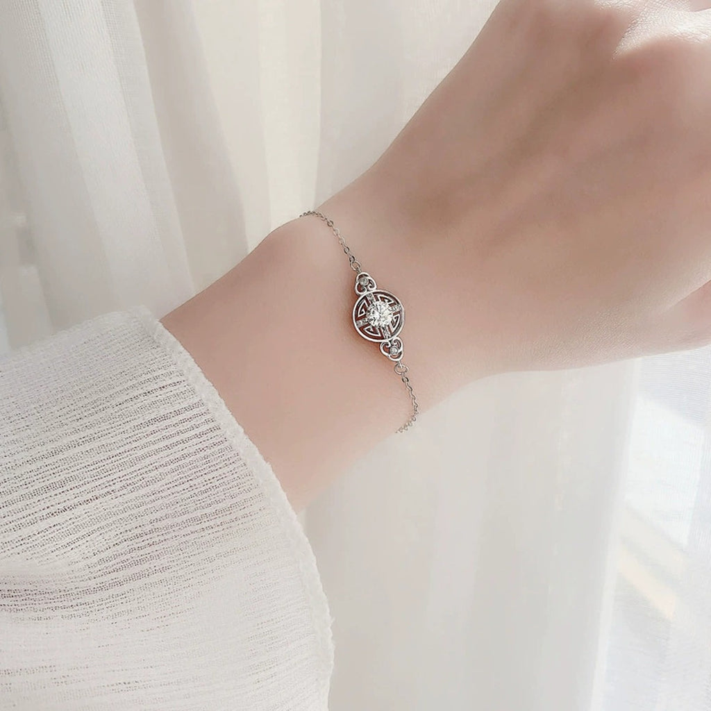 Ancient Coin Round Moissanite Adjustable Bracelet with CZ in White Gold-Plated S925 Sterling Silver worn on the wrist showing bracelet scale, fit, and styling