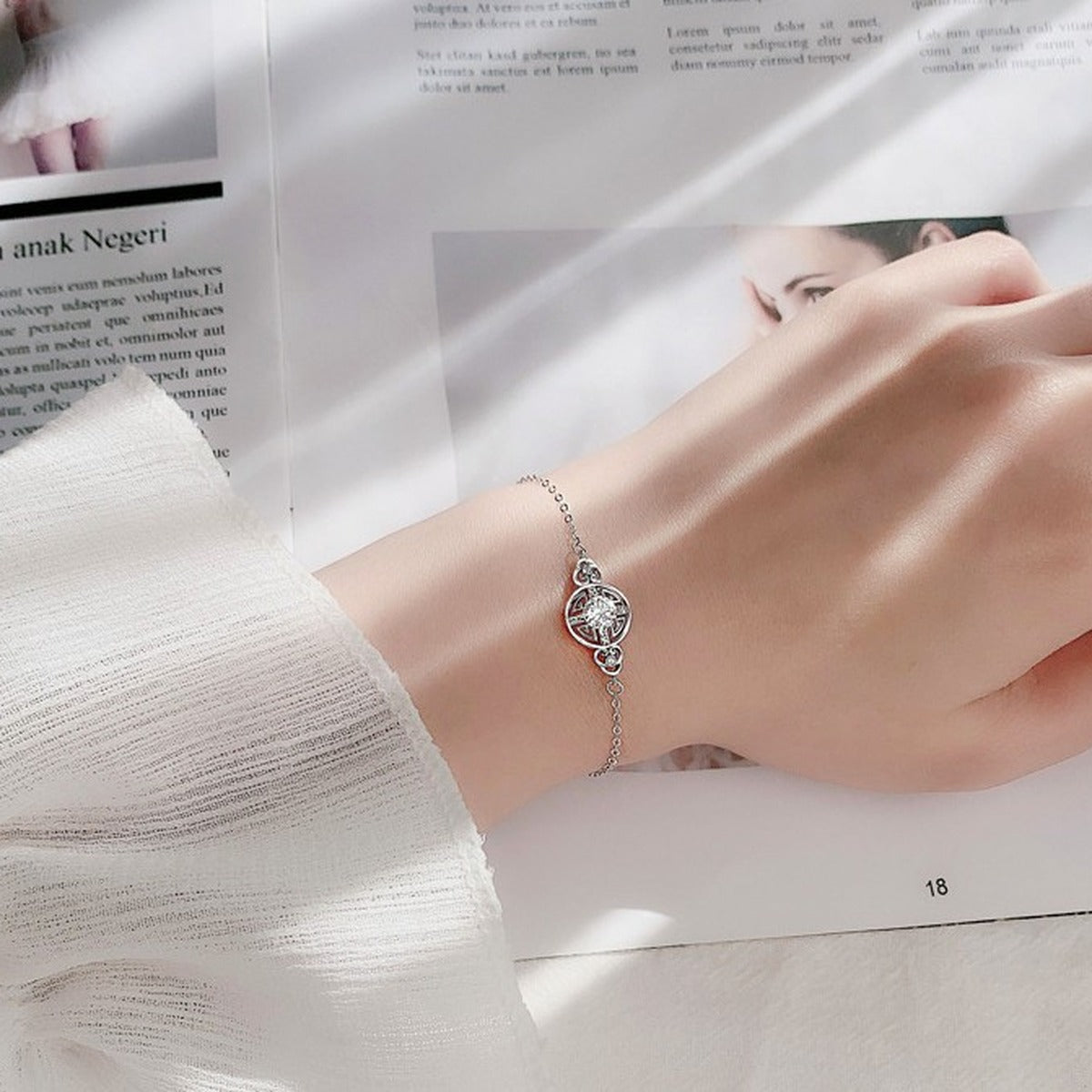 Ancient Coin Round Moissanite Adjustable Bracelet with CZ in White Gold-Plated S925 Sterling Silver worn on the wrist showing bracelet scale, fit, and styling