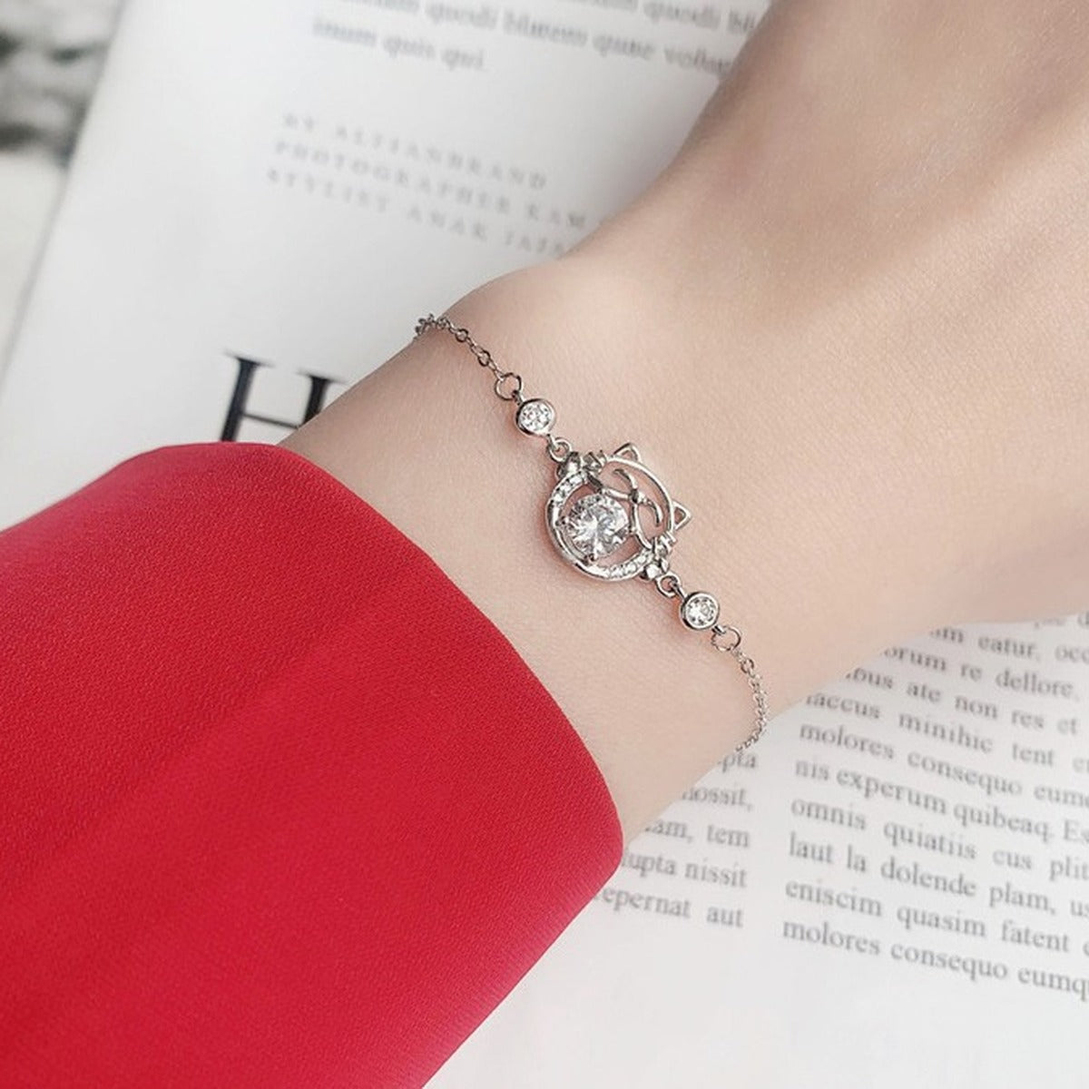 Cat Round Moissanite Adjustable Bracelet with CZ in White Gold-Plated S925 Sterling Silver worn on the wrist showing bracelet scale, fit, and styling